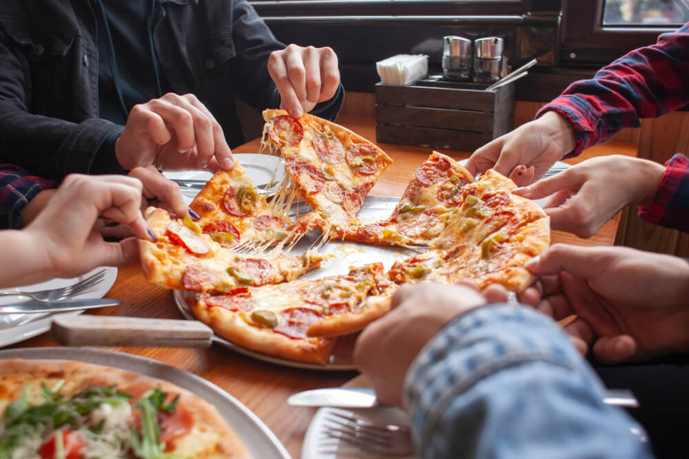 People eating pizza